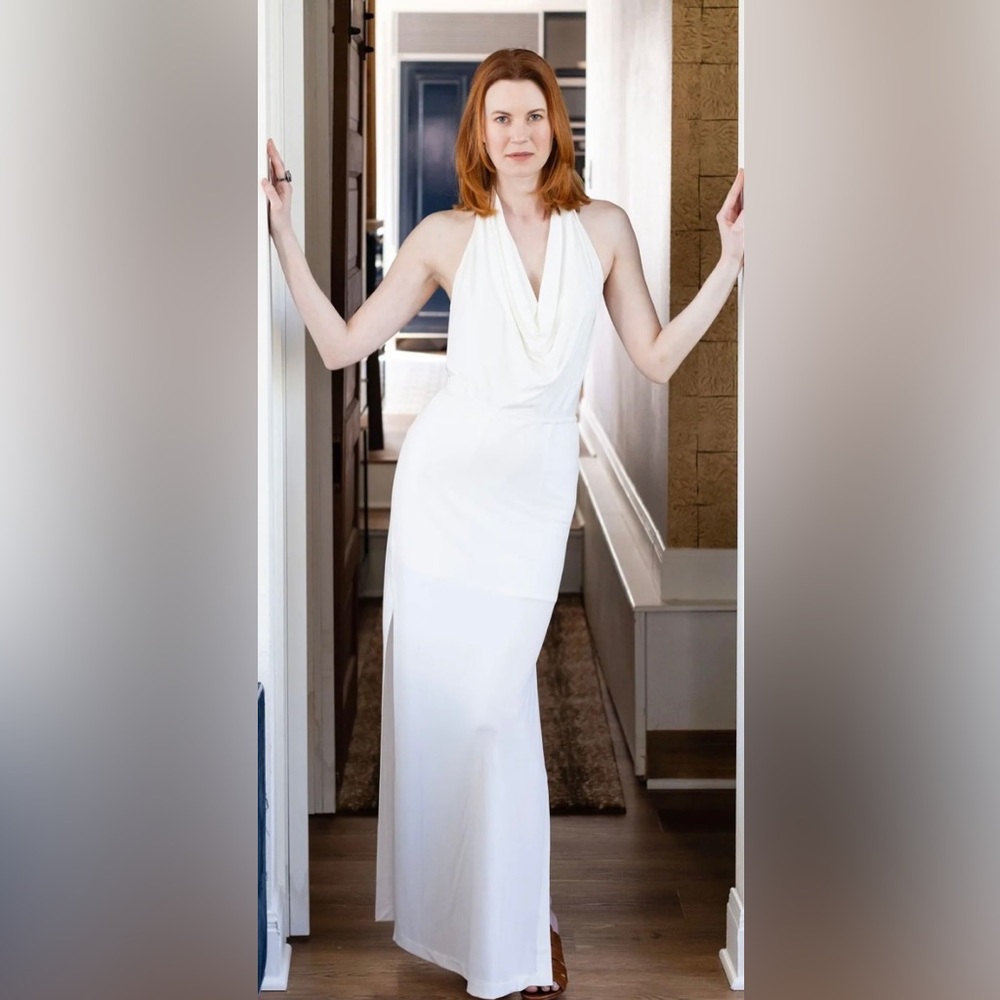 BAE LILES Sexy form-fitting dress with plunging cowl neck, open back, side slip.